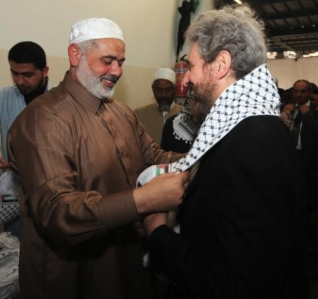 Stanley Cohen (right) in Gaza with one of the two disputed Prime Ministers of the Palestinian National Authority, Ismail Haniyeh. (Photo by Peter Spagnuolo via)